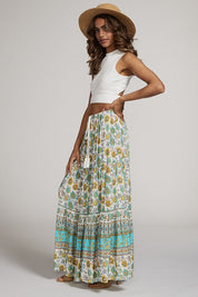 Women's Elastic Waist Printed Maxi Skirt with Tassel Detail