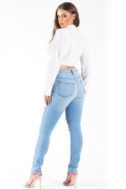 Women's High Rise Ripped Skinny Jeans in Light Wash