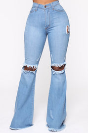 Women's High Rise Flare Jeans with Knee Rips in Medium Wash