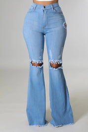 Women's High Rise Flare Jeans with Knee Rips in Medium Wash