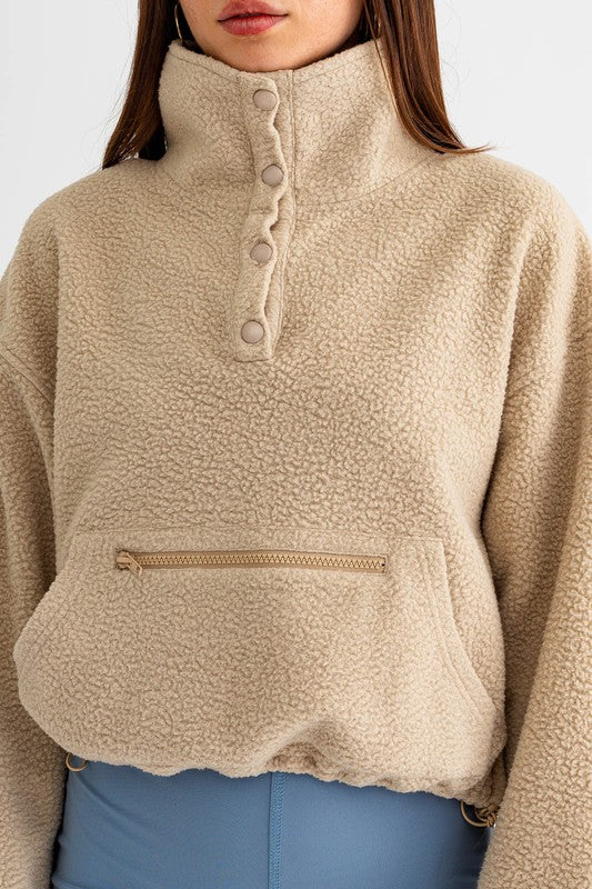 Women's Oversized Fleece Pullover Sweater with Pocket Detail