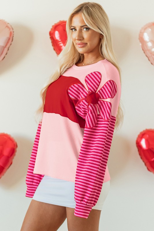 Women's Textured Knit Top with Striped Sleeves and Floral Patch