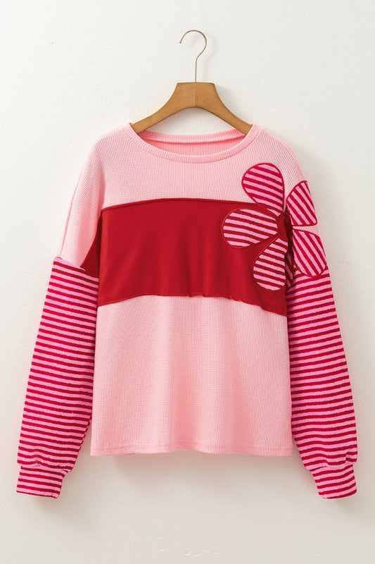 Women's Textured Knit Top with Striped Sleeves and Floral Patch