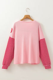 Women's Textured Knit Top with Striped Sleeves and Floral Patch